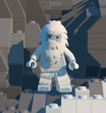 A yeti standing on a pile of rocks